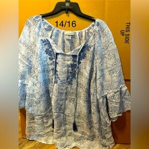 Woman’s blouse size 14/16